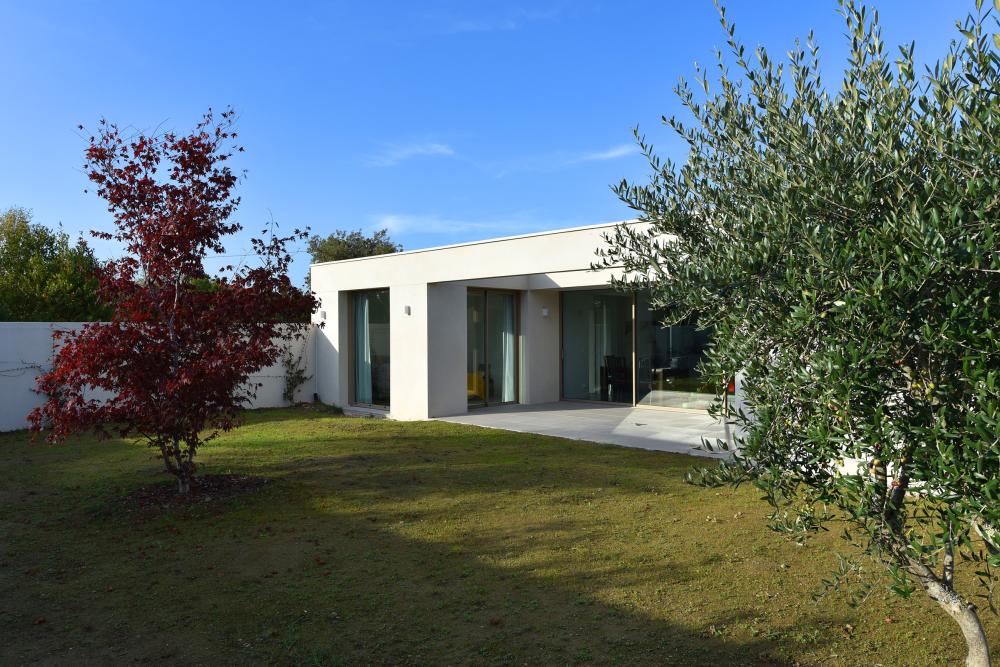 ©Atelier 319 Carole de Pérignon Vue façade arrière maison en démarche BIMBY - Atelier Architecture 319